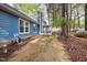 Backyard featuring the sunroom and wooded area at 2709 Hidden Hollow Dr, Durham, NC 27703