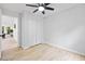 Empty bedroom with closet and light wood floors at 2709 Hidden Hollow Dr, Durham, NC 27703