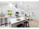Kitchen with island, stainless appliances, and adjacent dining area at 2709 Hidden Hollow Dr, Durham, NC 27703