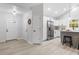 Open-concept kitchen featuring stainless appliances and a breakfast bar at 2709 Hidden Hollow Dr, Durham, NC 27703