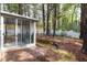Sunroom with access to the backyard at 2709 Hidden Hollow Dr, Durham, NC 27703