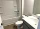 Well-lit bathroom with shower-tub combo and modern vanity at 288 Olivia Crossing Ct # 10, Four Oaks, NC 27524