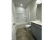 Bathroom features a shower and tub combination with a single vanity and tile flooring at 288 Olivia Crossing Ct # 10, Four Oaks, NC 27524