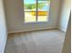 Cozy bedroom with natural light and plush carpeting at 288 Olivia Crossing Ct # 10, Four Oaks, NC 27524