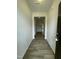 Inviting entryway with hard wood flooring and neutral paint, leading into the home's interior at 288 Olivia Crossing Ct # 10, Four Oaks, NC 27524