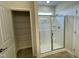 Bathroom with glass shower and storage closet is clean and functional at 288 Olivia Crossing Ct # 10, Four Oaks, NC 27524