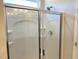 A frameless glass shower featuring a rain shower head and sleek hardware at 288 Olivia Crossing Ct # 10, Four Oaks, NC 27524