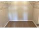 Spacious walk-in closet with shelving for easy storage and organization at 288 Olivia Crossing Ct # 10, Four Oaks, NC 27524