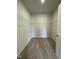 Spacious walk-in closet with carpeted floor and wire shelving offers ample storage space at 288 Olivia Crossing Ct # 10, Four Oaks, NC 27524