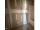 Bathroom featuring unfinished drywall, and tub/shower combo at 2895 Bakers Chapel Rd, Smithfield, NC 27577