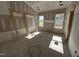 Bedroom features drywall, trimwork, and natural light from the windows overlooking the neighborhood at 2895 Bakers Chapel Rd, Smithfield, NC 27577