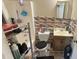 Bathroom featuring a bathtub, shower, toilet, and sink at 300 E Vance St, Zebulon, NC 27597