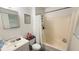 Bathroom featuring a bathtub, shower, toilet, and sink at 300 E Vance St, Zebulon, NC 27597