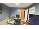 Bedroom featuring carpet flooring, natural light and an open closet at 300 E Vance St, Zebulon, NC 27597