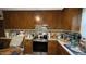 Kitchen featuring stainless steel appliances and wood cabinets at 300 E Vance St, Zebulon, NC 27597