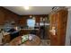 Kitchen featuring stainless steel appliances and wood cabinets at 300 E Vance St, Zebulon, NC 27597