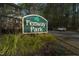 View of the Fenway Park community sign with nice landscaping and greenery around the property at 300 Nc 54 Highway # E2, Carrboro, NC 27510
