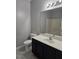 Bathroom featuring a toilet, sink, vanity, mirror, and shower/tub combo at 3015 Winston Dr # 111, Burlington, NC 27215