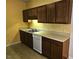 Efficient kitchen featuring stainless steel sink, dishwasher, and plenty of cabinet space at 3015 Winston Dr # 111, Burlington, NC 27215
