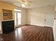 Inviting living room featuring hardwood floors, fireplace, ceiling fan, and natural light at 3015 Winston Dr # 111, Burlington, NC 27215