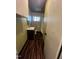 Bathroom featuring wood-look floors, a single sink vanity, and a shower-tub combo at 327 Holland Dr Rd, Smithfield, NC 27577