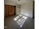 This bedroom includes a closet, built-in shelves, and light-colored walls at 327 Holland Dr Rd, Smithfield, NC 27577