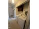 Hall laundry room featuring washer, and dryer at 327 Holland Dr Rd, Smithfield, NC 27577