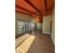 Inviting living room featuring high ceilings, exposed beams, and lots of natural light at 327 Holland Dr Rd, Smithfield, NC 27577