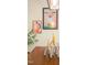 Close-up of unique candle decor and wall art adding a stylish touch to this bright dining space at 3303 Silver Star Dr, Durham, NC 27713