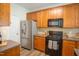 This spacious kitchen offers stainless steel appliances, lots of counter space and ample storage at 3303 Silver Star Dr, Durham, NC 27713