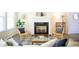 Inviting living room featuring a fireplace, comfortable seating, and stylish decor for a cozy ambiance at 3303 Silver Star Dr, Durham, NC 27713