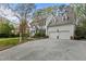 Traditional home with dormer windows, two-car garage, and well-manicured front lawn at 3308 Churchill Rd, Raleigh, NC 27607