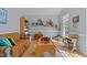 Bright playroom with built-in shelving, a desk, and ample play space at 3308 Churchill Rd, Raleigh, NC 27607