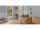Well-lit playroom features hardwood floors, multiple windows, and a desk at 3308 Churchill Rd, Raleigh, NC 27607