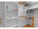 Walk-in closet with shelving, hanging racks, and hardwood floors at 3308 Churchill Rd, Raleigh, NC 27607