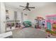 Bright bedroom with ample space for play, features neutral decor and functional storage at 34 Stuart Dr, Benson, NC 27504