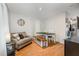 Bright dining area with wood floors, bench seating, and stylish decor creates an inviting and cozy atmosphere at 34 Stuart Dr, Benson, NC 27504