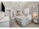 Comfortable main bedroom with vaulted ceiling, ceiling fan and stylish decor, offering a serene retreat at 34 Stuart Dr, Benson, NC 27504
