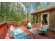 Relaxing outdoor deck with seating, perfect for enjoying the surrounding landscape at 3508 Cole Mill Rd, Durham, NC 27712