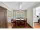 Inviting dining room with hardwood floors and lots of natural light at 3508 Cole Mill Rd, Durham, NC 27712