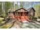 Charming home with a welcoming front porch, nestled in a wooded setting at 3508 Cole Mill Rd, Durham, NC 27712