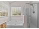 This is a bathroom with a soaking tub and a glass shower enclosure at 3517 Boren Ct, Raleigh, NC 27616