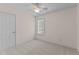 Carpeted bedroom with a fan and a window at 3517 Boren Ct, Raleigh, NC 27616