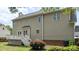 Spacious home exterior showcasing a beautiful deck and well-maintained siding at 3517 Boren Ct, Raleigh, NC 27616