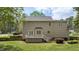 View of a beautiful home exterior and well-maintained backyard, with deck at 3517 Boren Ct, Raleigh, NC 27616