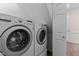 Convenient laundry room with side by side appliances and easy access at 3517 Boren Ct, Raleigh, NC 27616