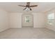 Spacious bedroom with neutral carpet, light walls and ceiling fan at 360 Callandale Ln, Durham, NC 27703
