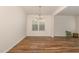 Elegant dining room with hardwood floors, chandelier, and lots of natural light at 360 Callandale Ln, Durham, NC 27703