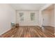 Bright and airy living room featuring beautiful hardwood floors and neutral paint at 360 Callandale Ln, Durham, NC 27703