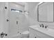 Bathroom featuring glass-enclosed shower, contemporary vanity, and modern finishes at 3832 Noremac Dr, Raleigh, NC 27612
